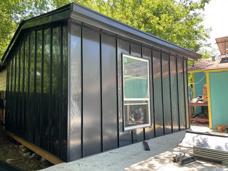 Black standing seam metal wall panels for Metal Roof Installation in Smyrna